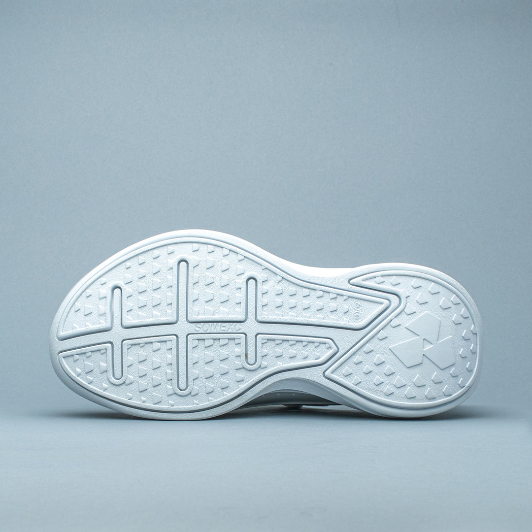 Bottom of shoe view of white Somexc recovery sneaker#color_white